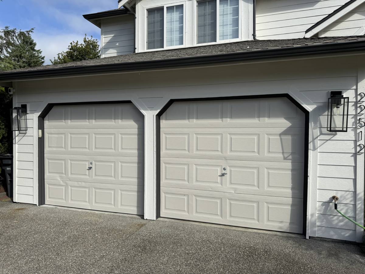 Residential Projects lsd afterupgraded garage with 2 8 x 7 wayne dalton 8300 medium oak bi directional long panel maple valley wa 1