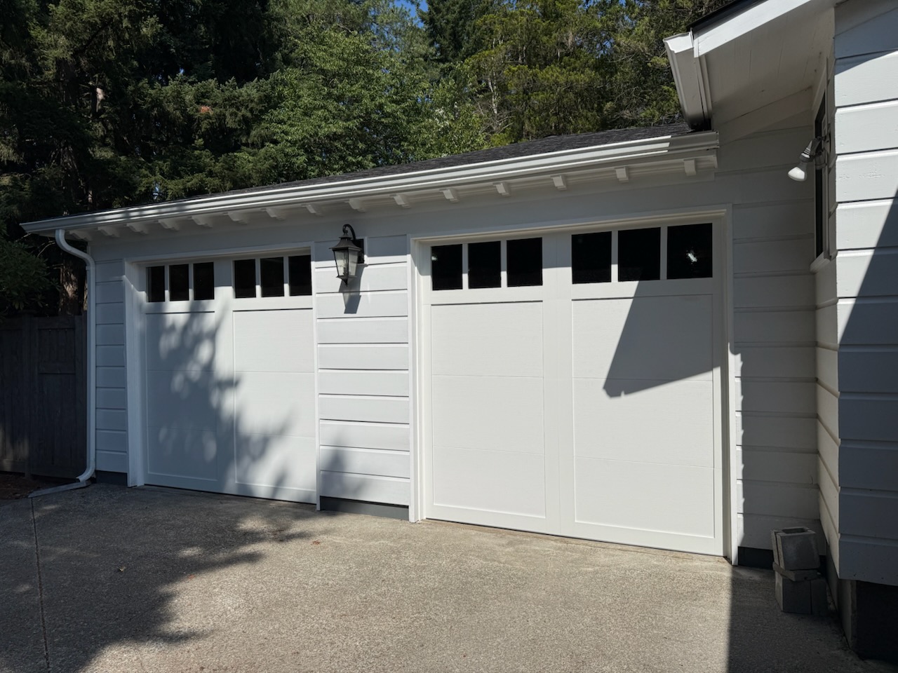 after Nice upgrade with 2 8x8 Clopay Canyon Ridge Elements with glass. Puyallup WA