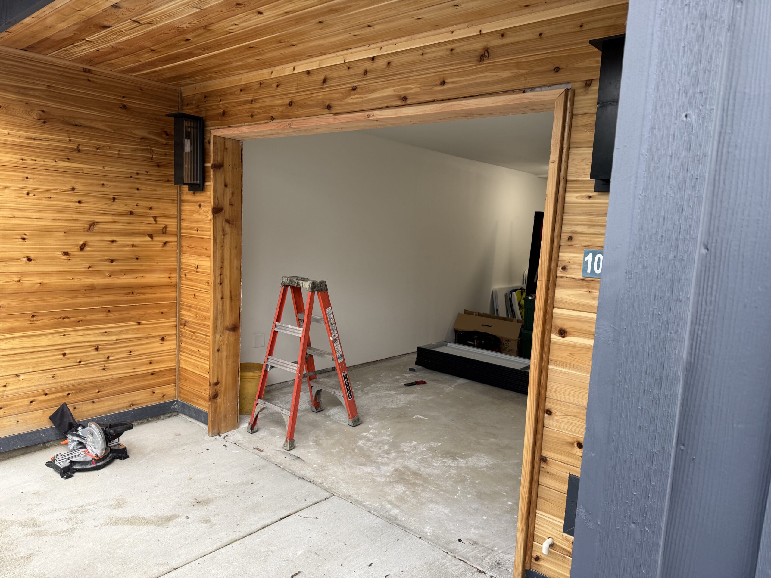 fixanoisygaragedoor2 garage door under construction | fix a noisy garage door