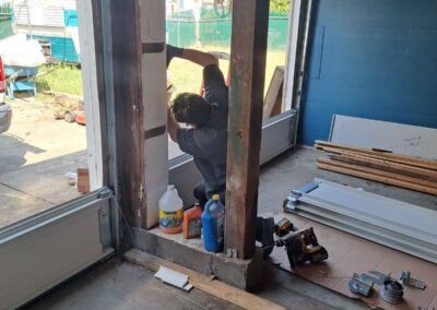 Worker working on a garage door repair