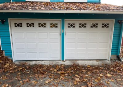 double white garage doors with glass