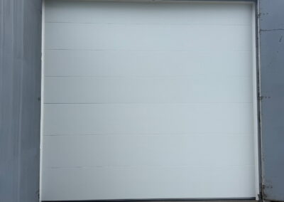 White flush panel garage door