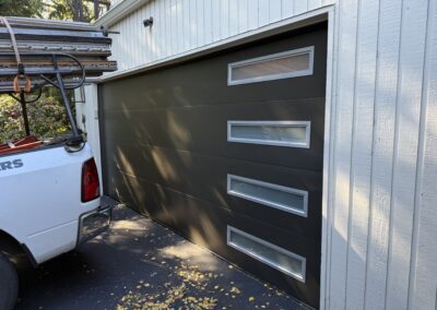 Flush mocha brown garage door with glass