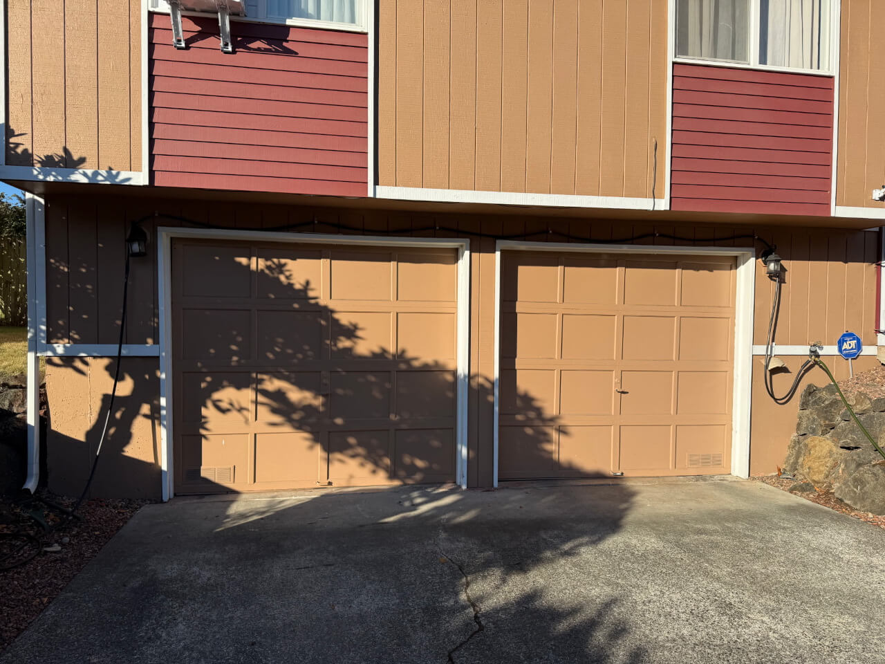 Residential Projects before garage door upgrade with clopay 9133 long panel with glass tacoma wa