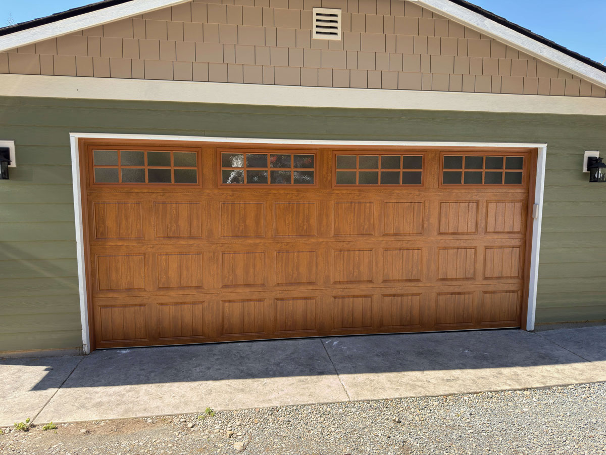 New wood residential garage door with Cloplay gallery door with glass | residential garage door services