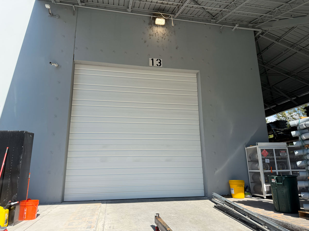 lsd-commercial-16-ft-2-inches-x-16-hormann-254p-insulated-with-hi-lift-kent-washington-2 White commercial warehouse garage door